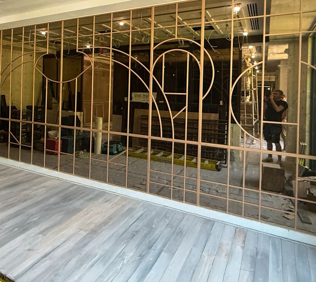 Antique bronze mirror wall with brass fretwork, Fairmont Windsor Park